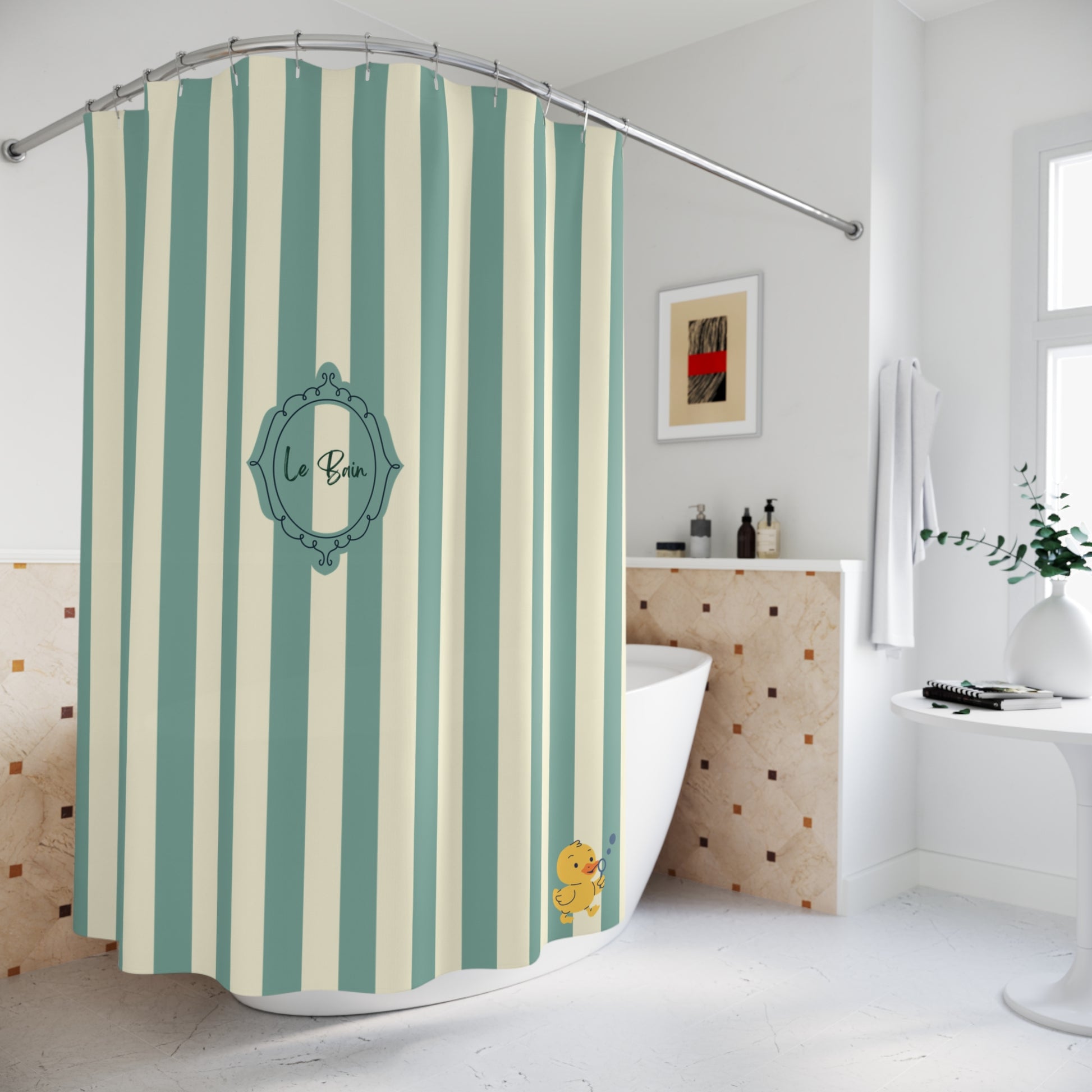A bathroom shower curtain with vertical mint green and cream stripes, featuring a central teal decorative frame with the text 'Le Bain' and a small yellow duck character near the bottom right. The curtain hangs from a curved metal rod over a white bathtub in a bright, modern bathroom.