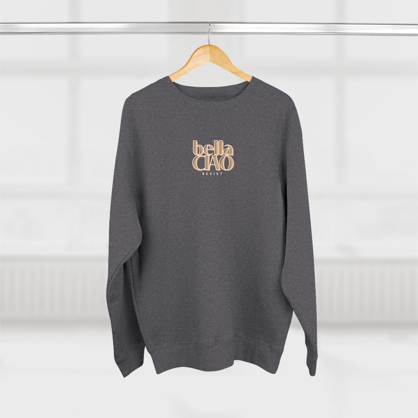 Gray sweatshirt with 'bella Ciao' text on a wooden hanger against a white background