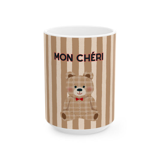 Mug with teddy bear design and 'MON CHERI' text on a striped background