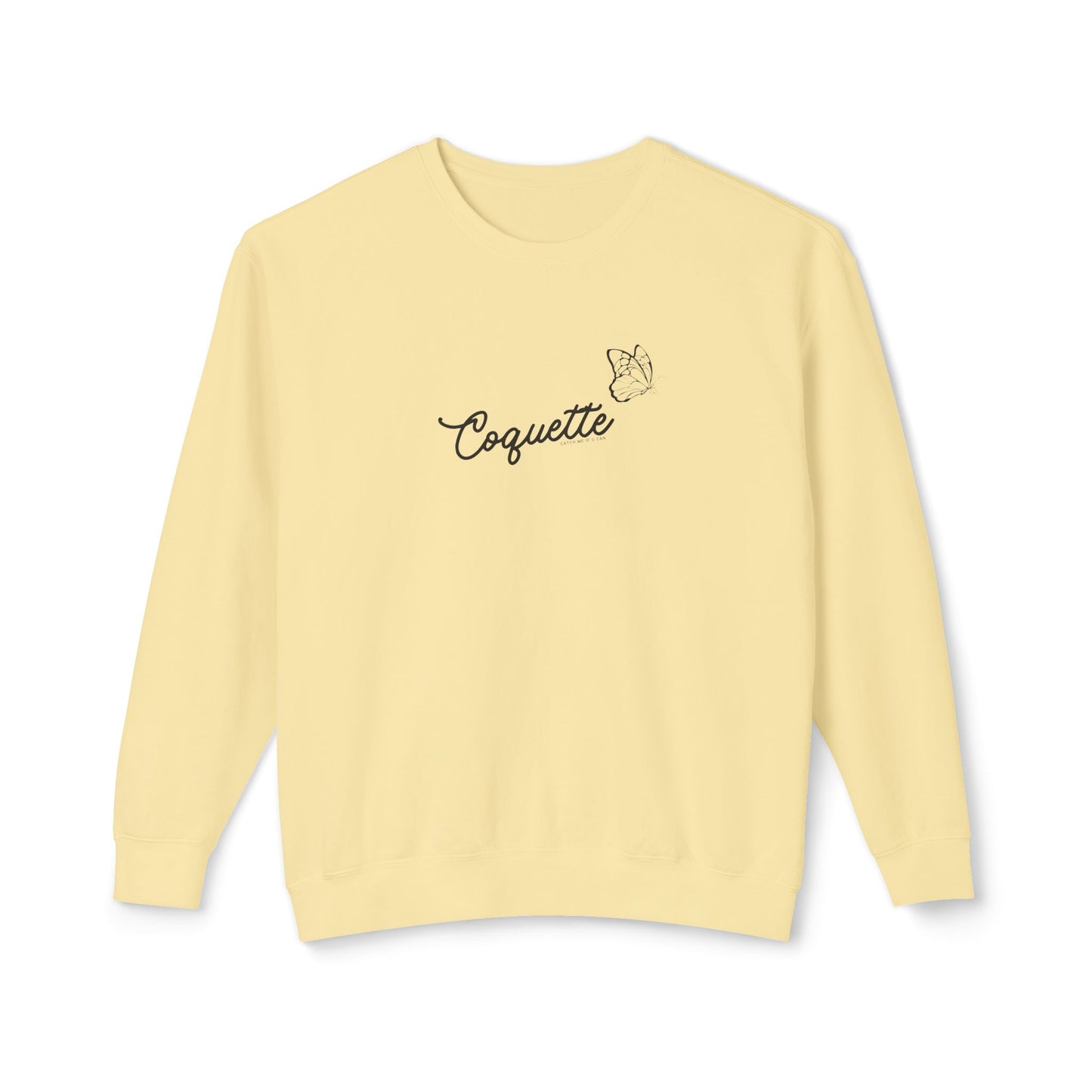 Light yellow sweatshirt with 'Coquette' text on a white background