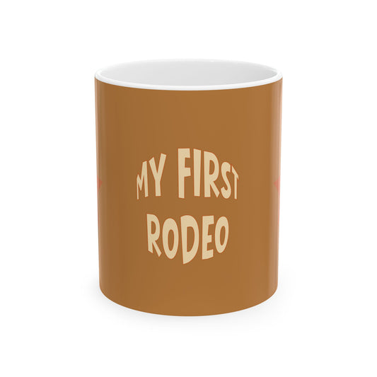 Brown mug with 'My First Rodeo' text on a white background