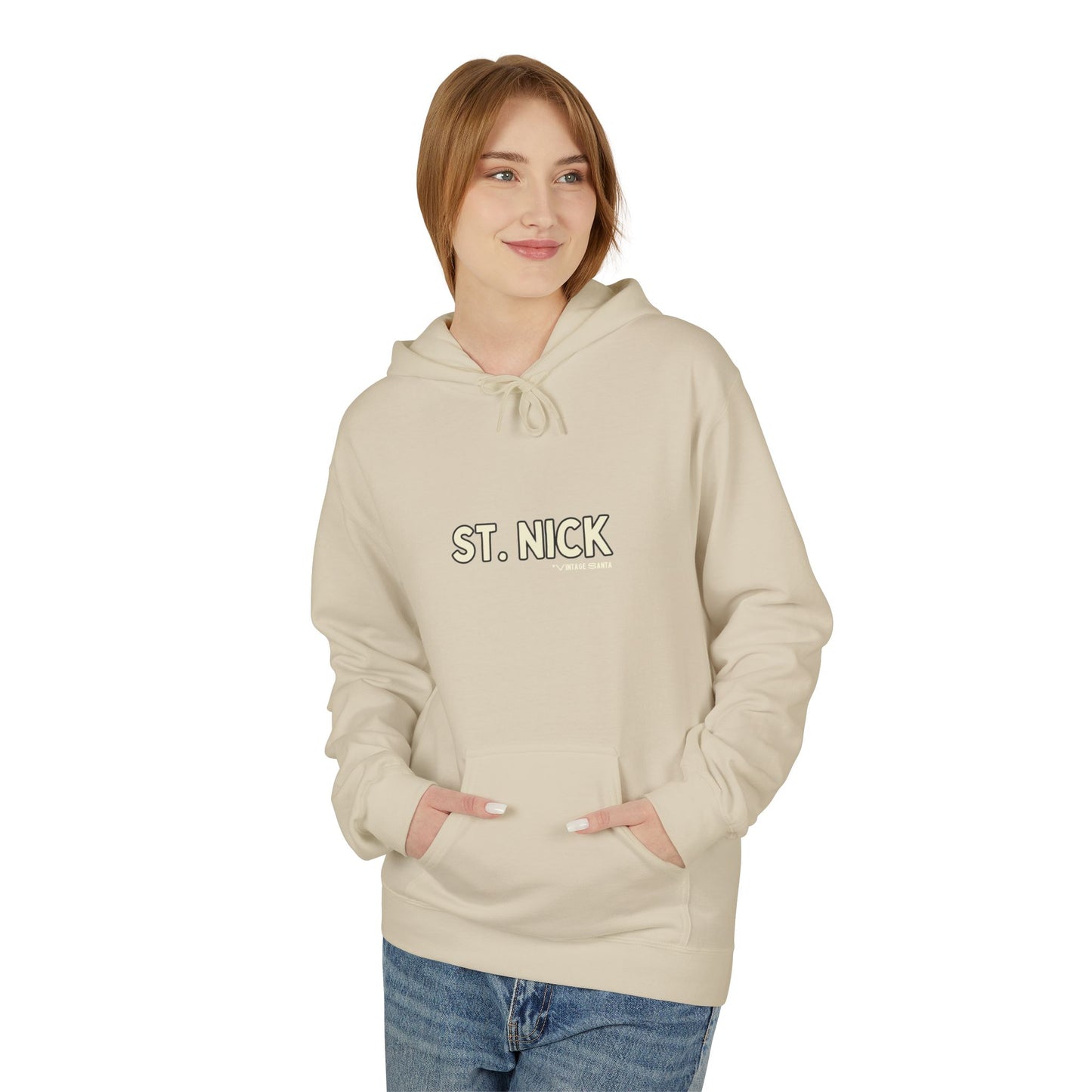 Person wearing a beige hoodie with 'ST. NICK' text on a white background