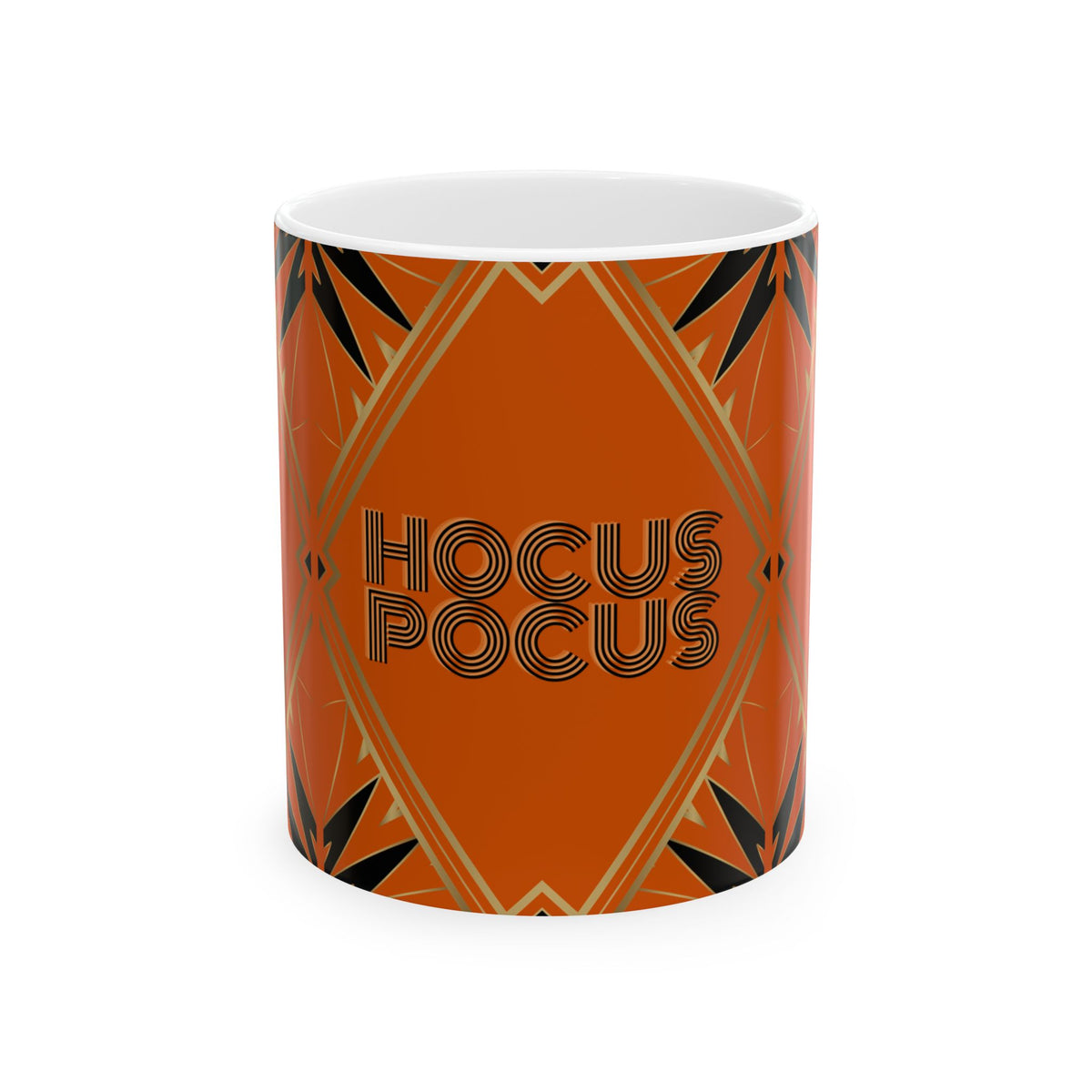 An orange ceramic mug with a geometric art deco pattern and the words 'HOCUS POCUS' printed on the front, set against a plain white background.