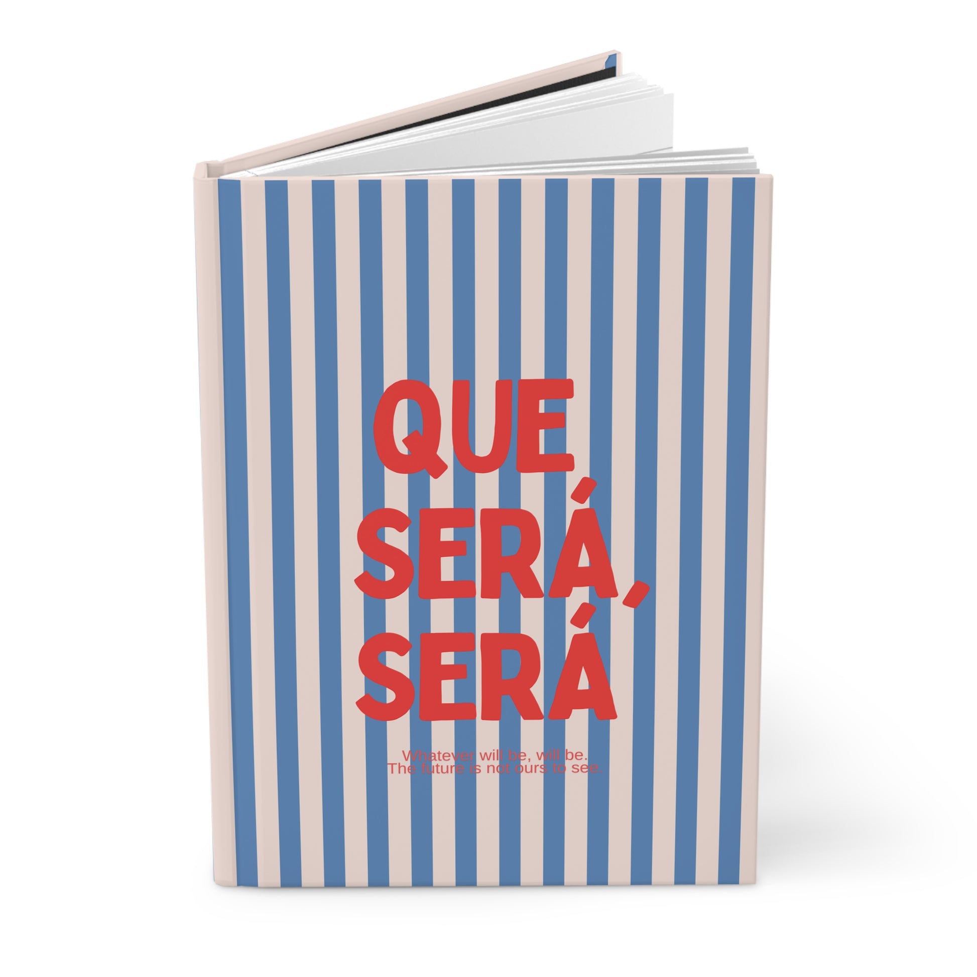 Que Sera Journal Book with blue and white striped cover and red text on a white background