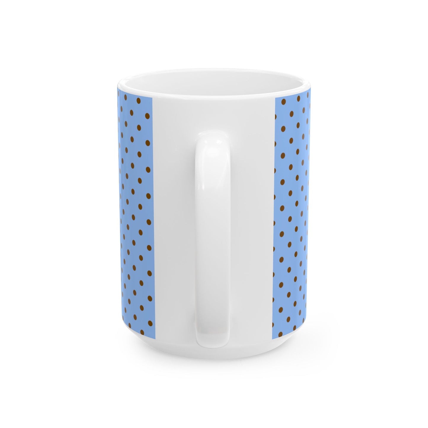 White mug with blue polka dot handles on a white background