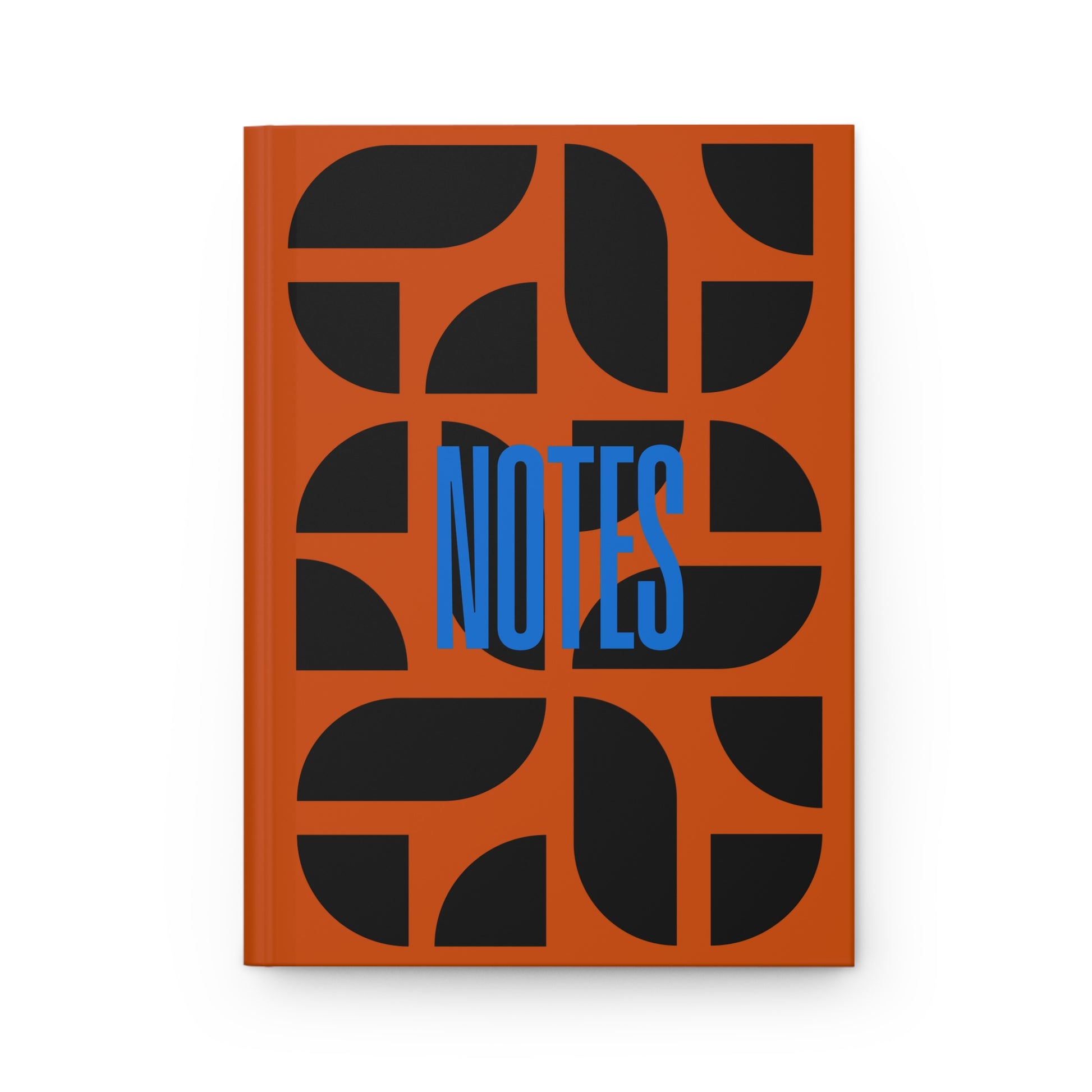 Notebook with orange cover featuring black abstract shapes and blue 'NOTES' text on a white background