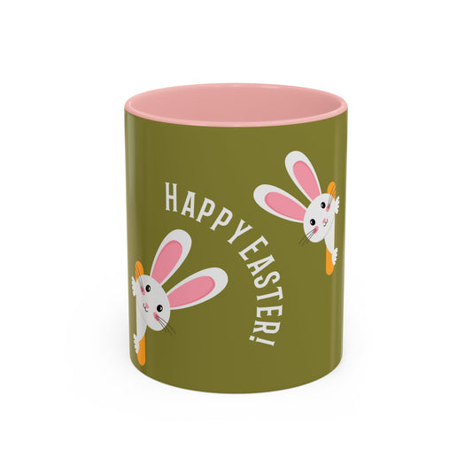 Green mug with pink interior, Easter bunny designs, and 'Happy Easter!' text on a white background