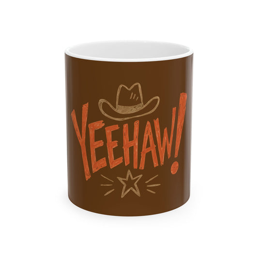 A brown ceramic mug with a white interior, featuring a hand-drawn style graphic of a cowboy hat and the word 'YEEHAW!' in orange, along with a star illustration, on a white background.