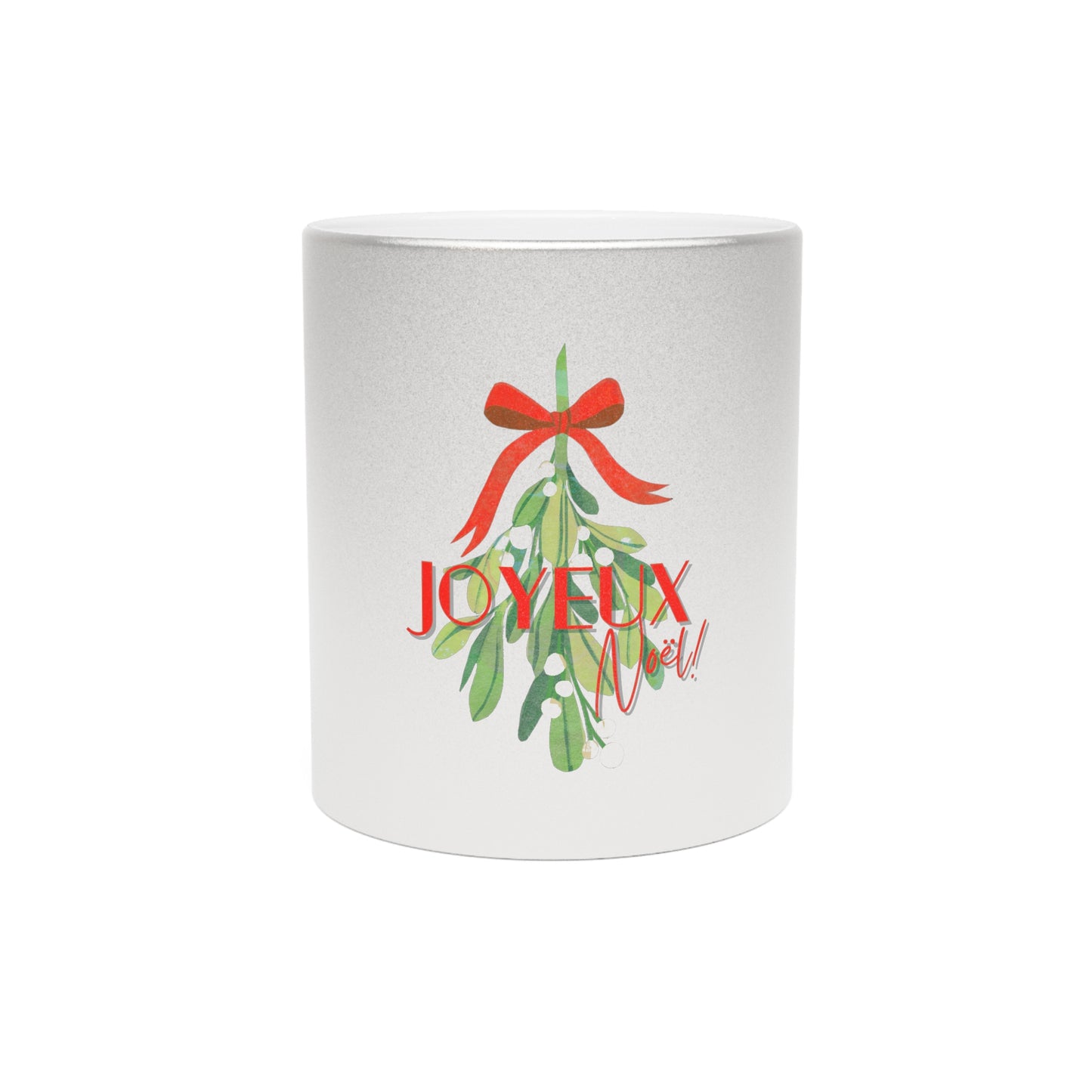 White mug with Christmas design featuring a red bow and green leaves with 'JOYEUX NOEL' text on a white background.