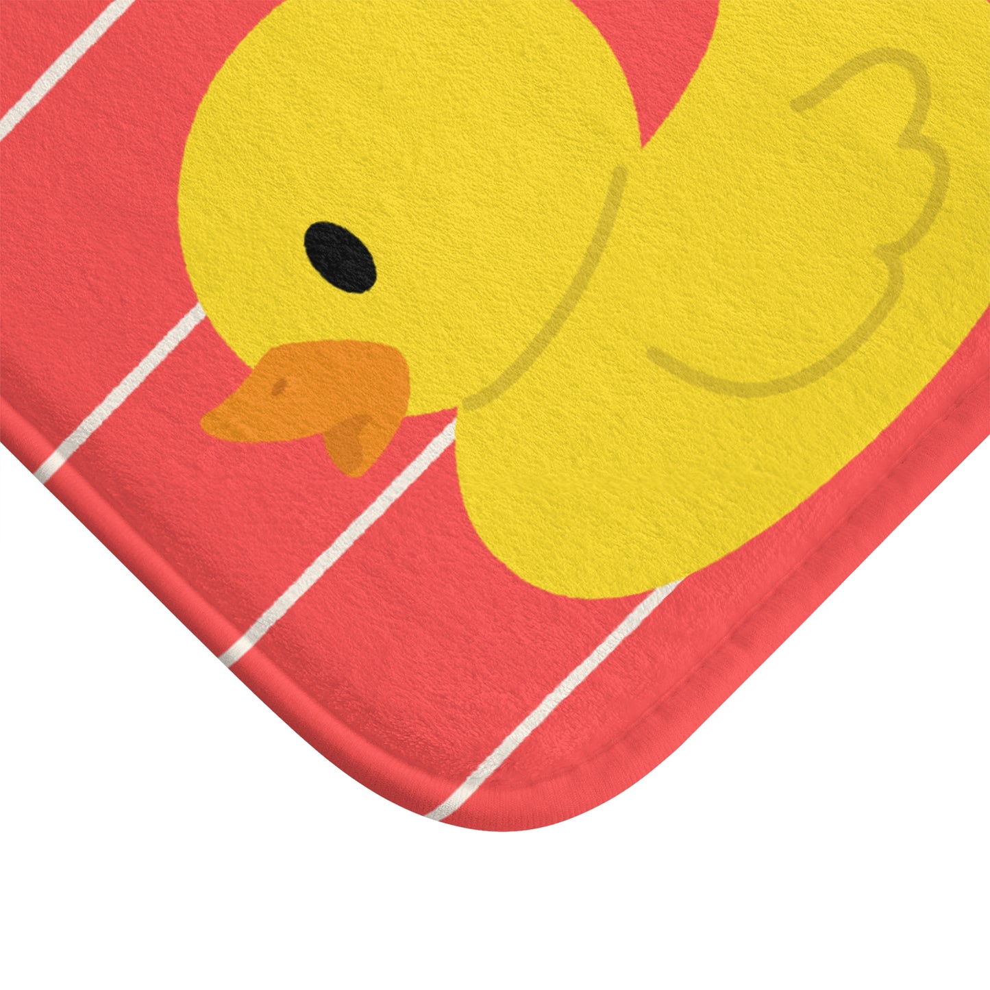 Yellow rubber duck on a red background