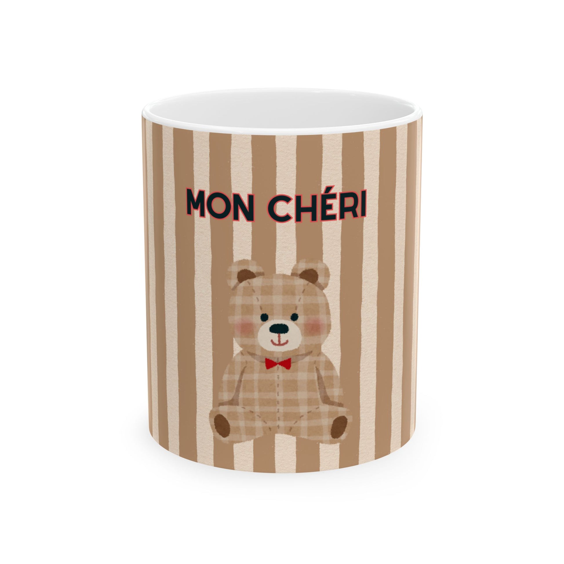 Mug with teddy bear design and 'MON CHÓRI' text on a striped background