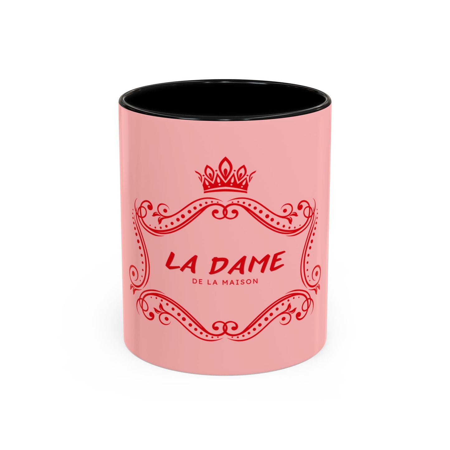 Pink mug with black interior and 'La Dame de la Maison' text on a white background