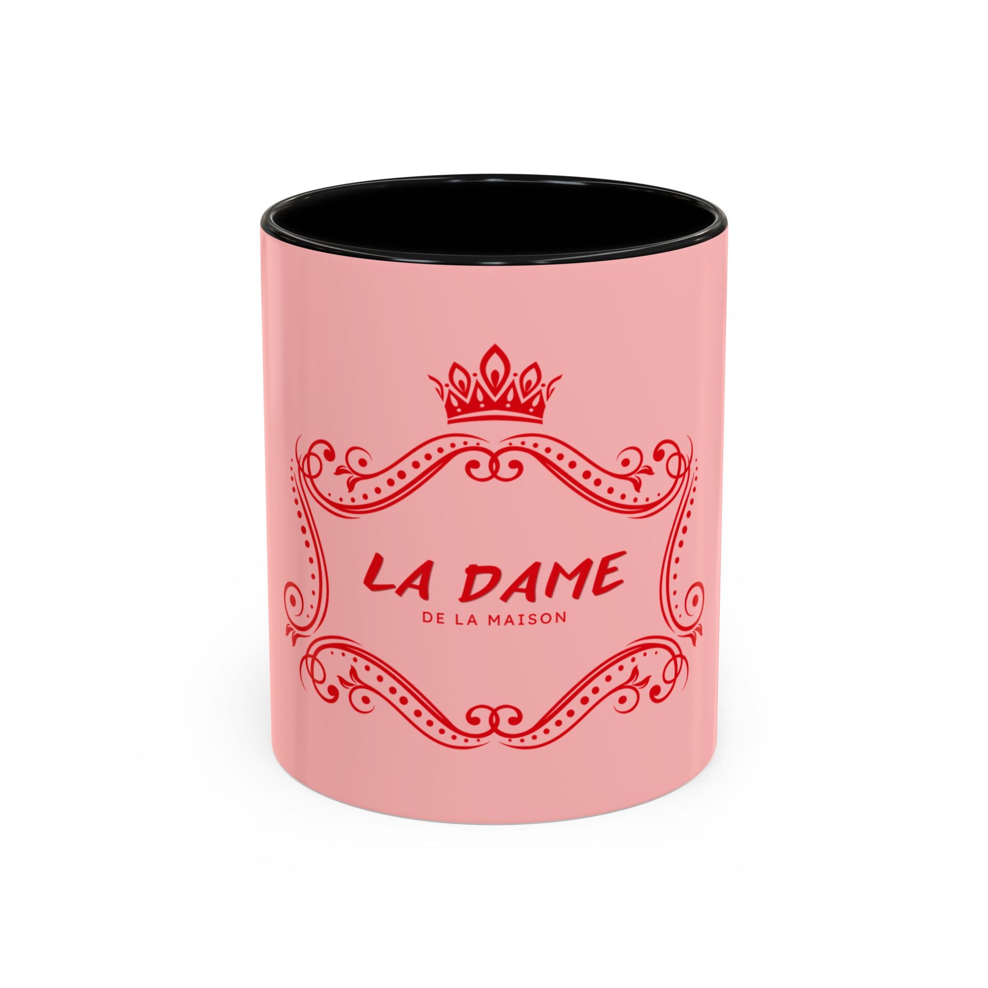 Pink mug with black interior and 'La Dame de la Maison' text on a white background