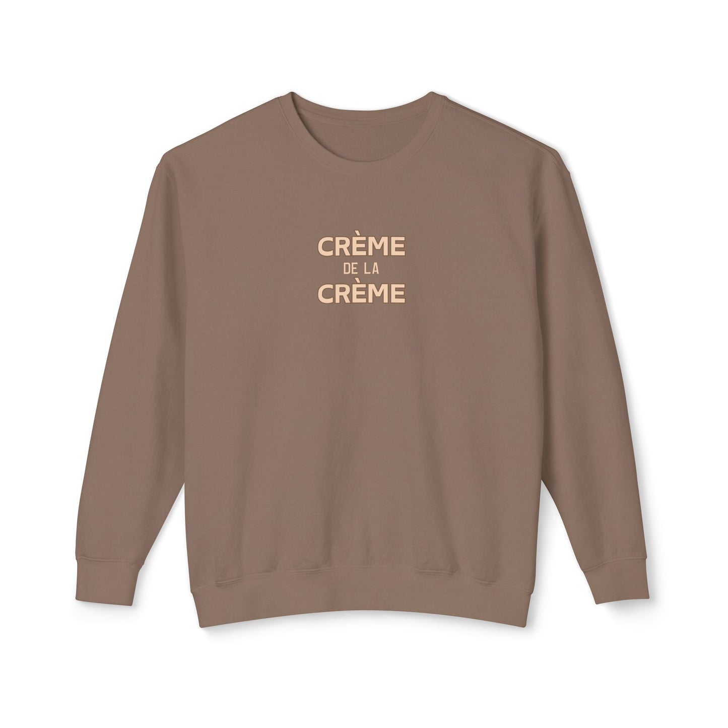 Brown sweatshirt with 'Crème de la Crème' text on a white background