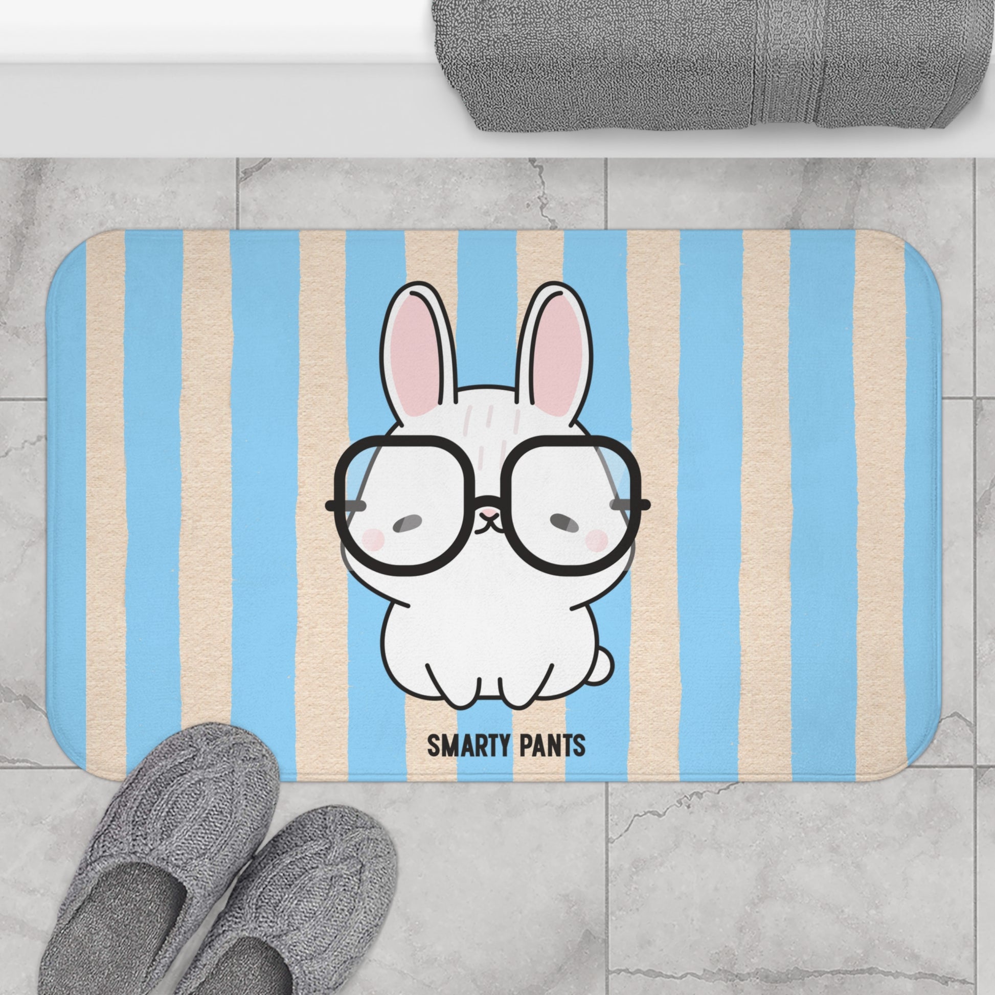 Doormat with a cartoon bunny wearing glasses and 'Smarty Pants' text on a striped background.