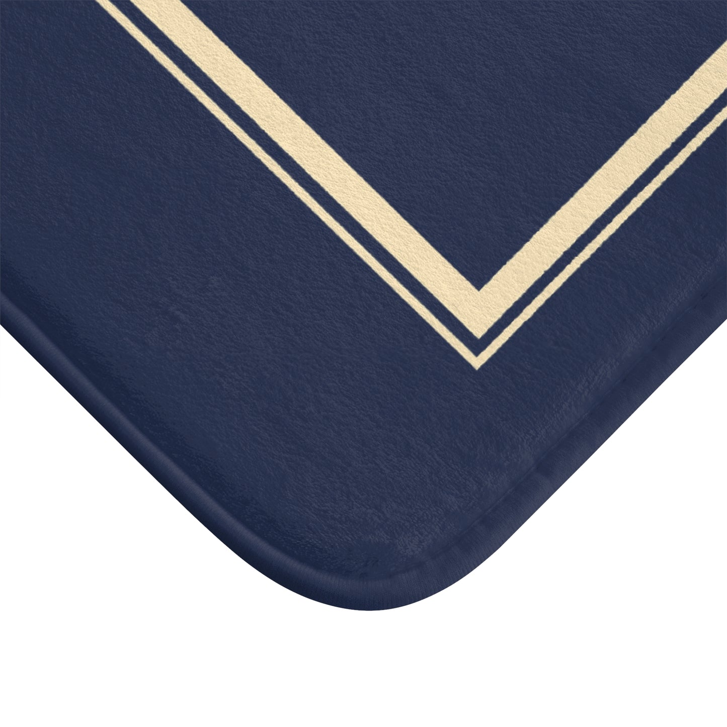 Navy blue mat with a gold border on a white background