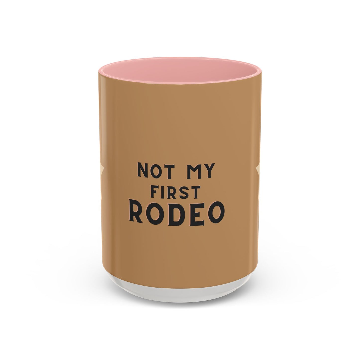 Brown tumbler with pink interior and 'Not My First Rodeo' text on a white background