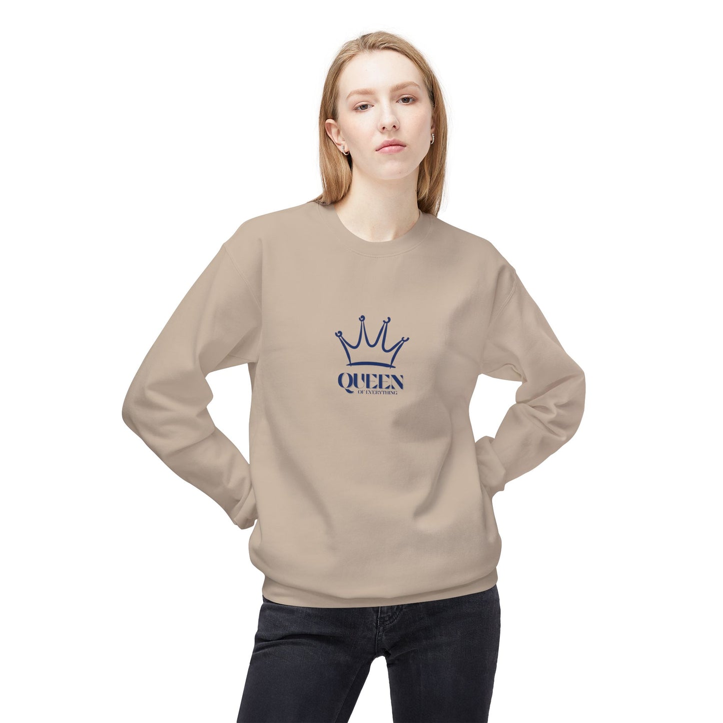 Person wearing a beige sweatshirt with a blue crown and 'QUEEN' text design on a white background