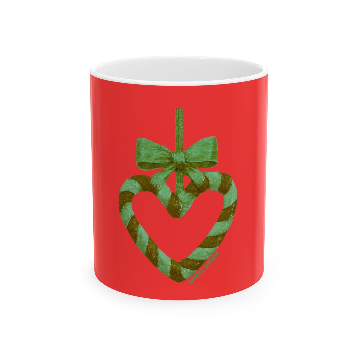 Red mug with a heart-shaped candy cane and green bow design on a white background