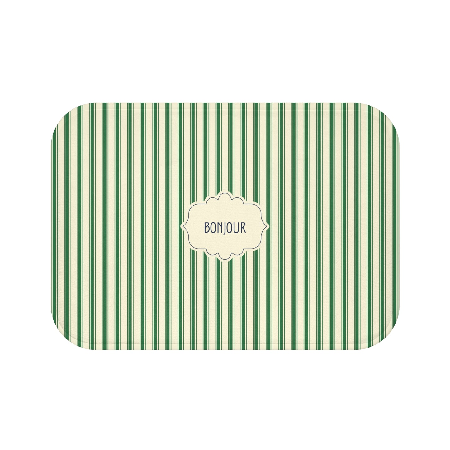 A luxe bath mat with rounded corners, featuring a green and white vertical stripe pattern and a central cream-colored label that reads 'BONJOUR'.
