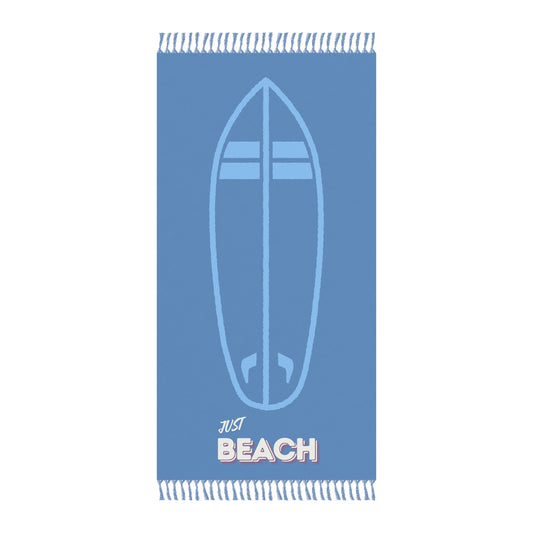 Blue beach towel with a surfboard design and 'Just Beach' text on a white background