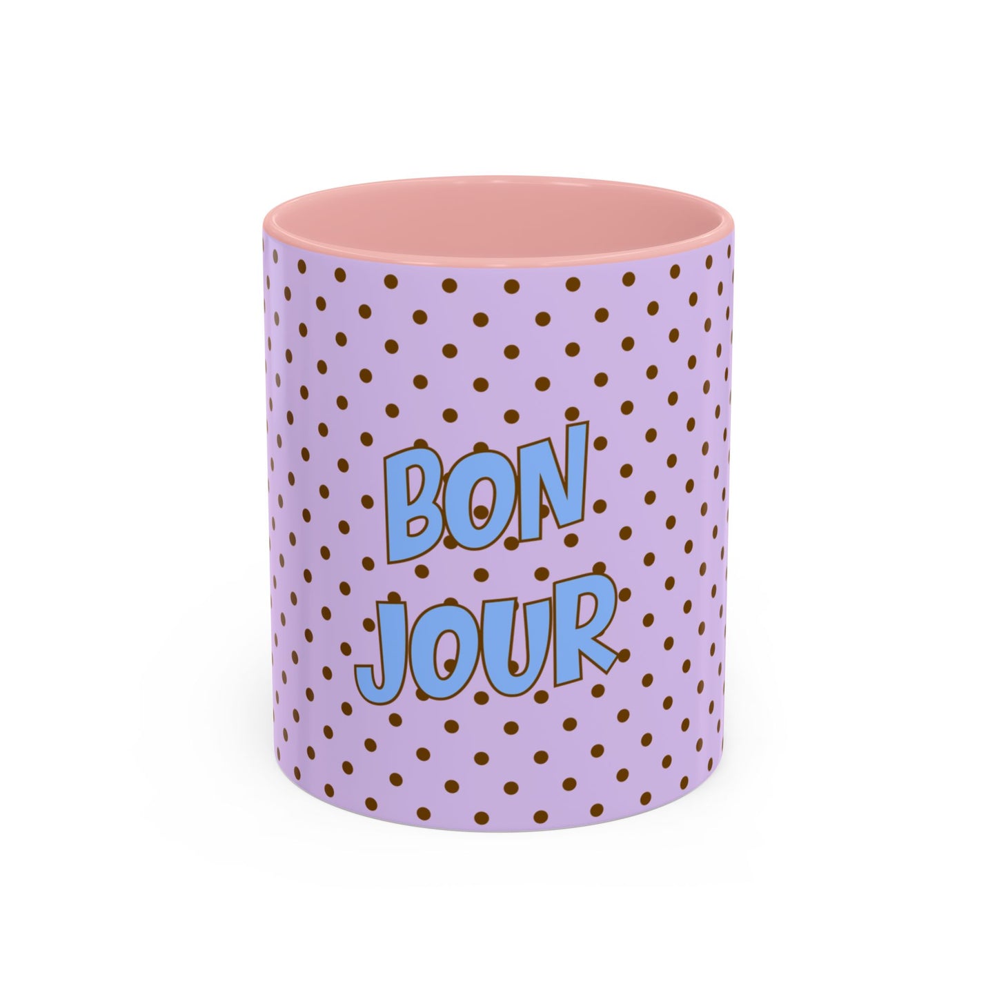 Purple polka dot mug with pink interior and 'Bonjour' text on a white background