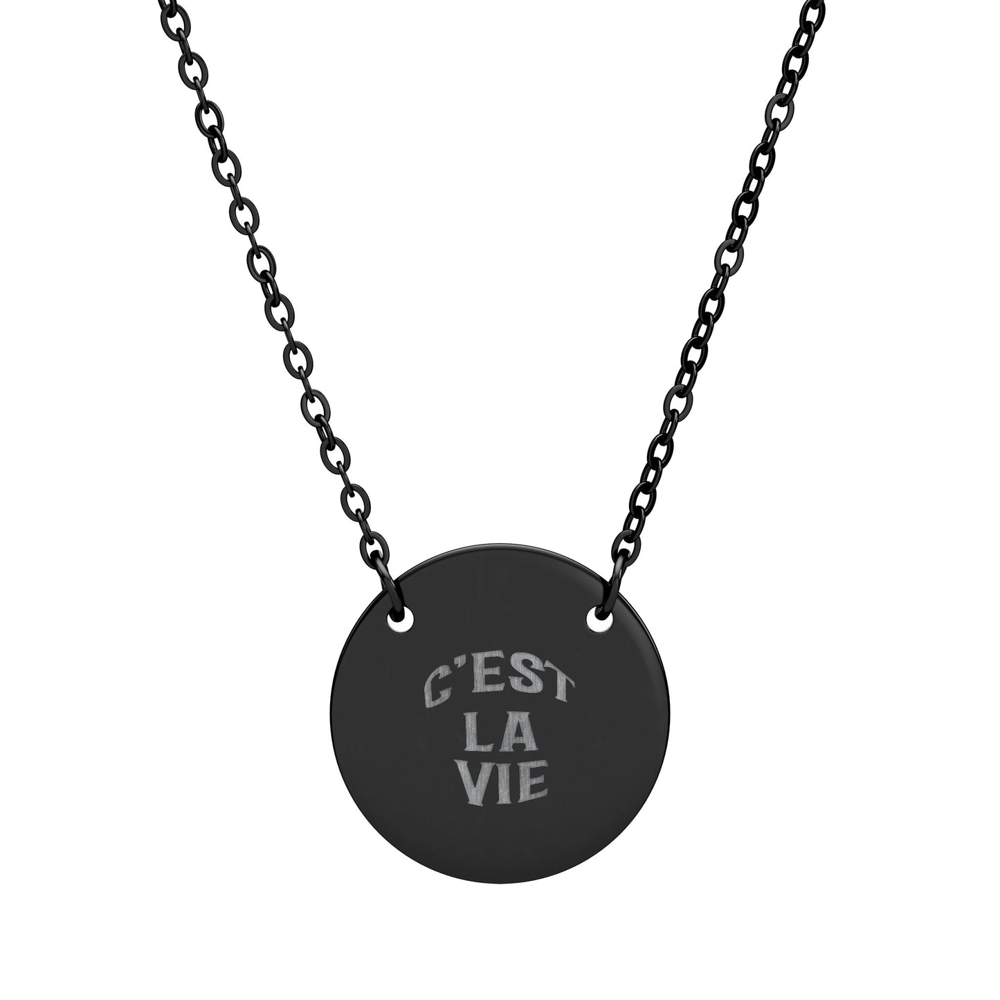 Black necklace with a round pendant featuring 'C'EST LA VIE' on a white background