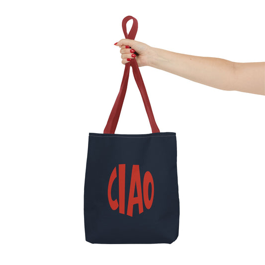 Navy tote bag with red 'CIAO' text held by a hand against a white background