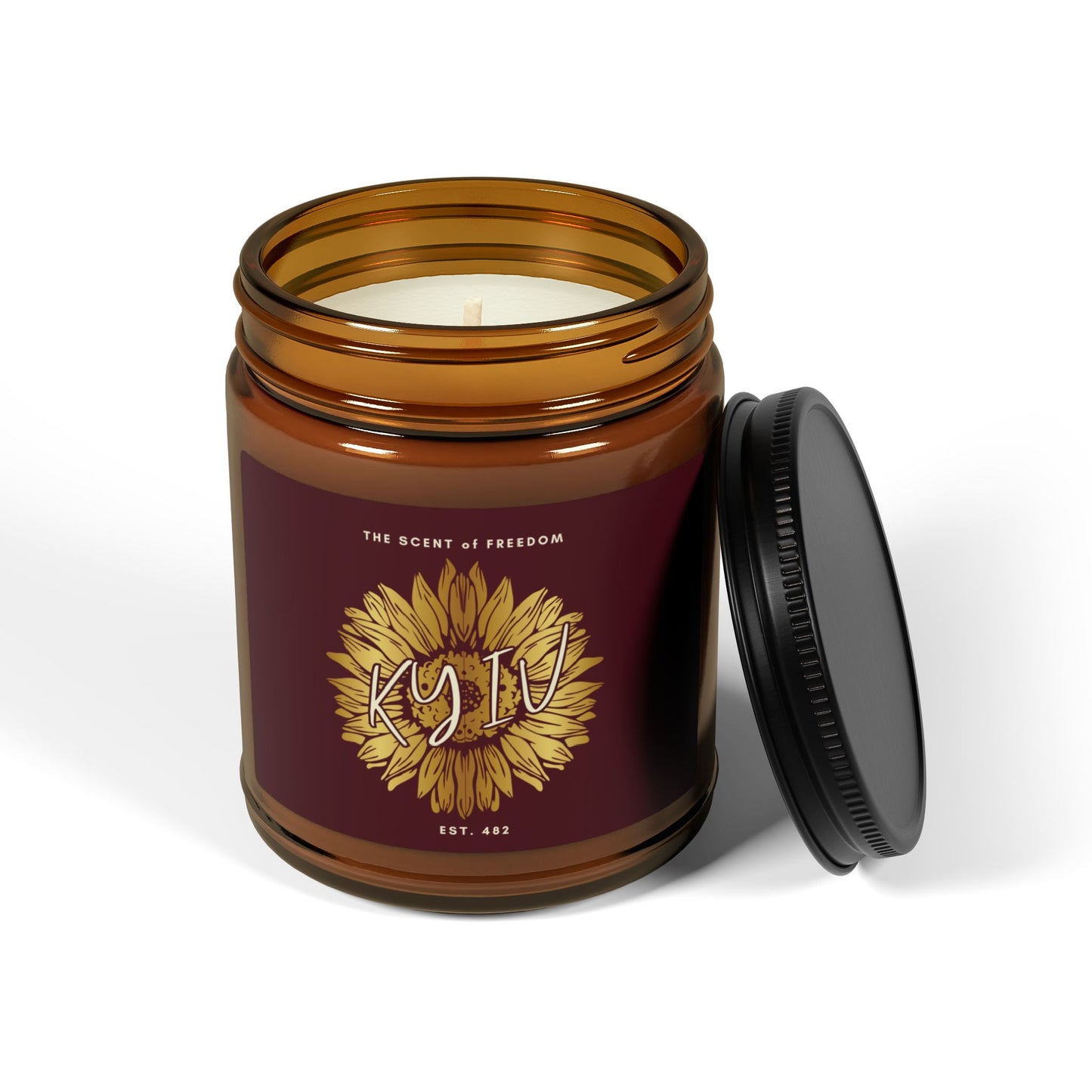 Candle in an amber jar with a sunflower KYIV design and text on a white background