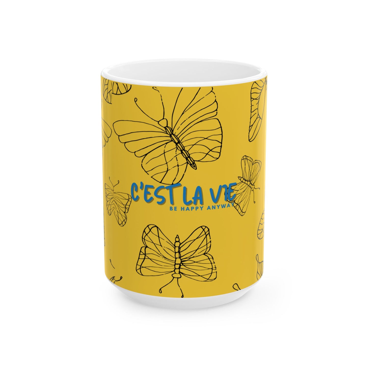 Yellow mug with butterfly designs and 'C'est La Vie' text on a white background