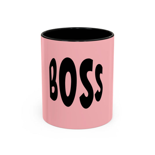 Pink mug with black interior and 'BOSS' text on a white background