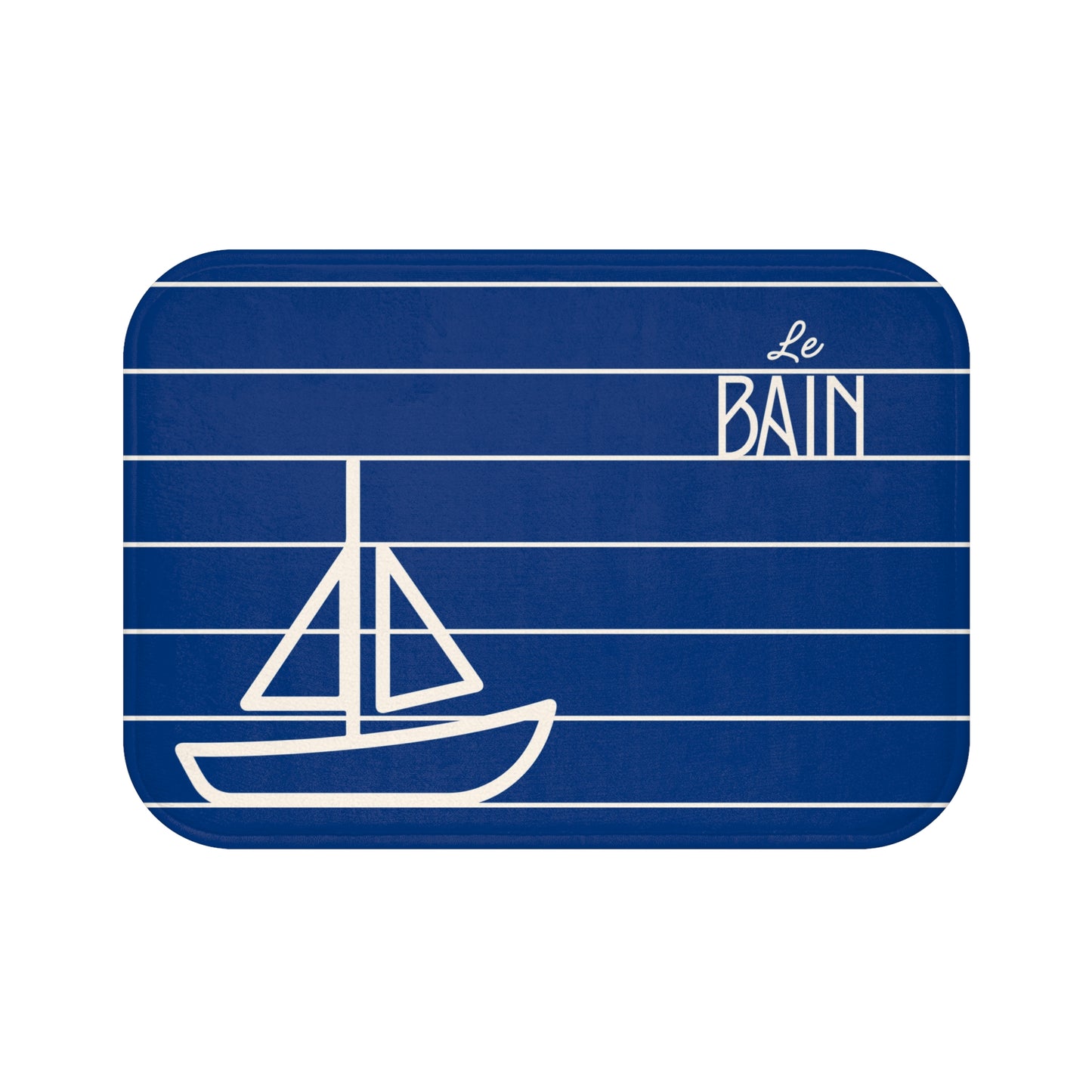 Blue mat with white sailboat design and 'Le Bain' text on a white background