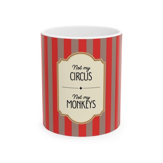 Mug with red and gray striped pattern and 'Not my circus, not my monkeys' text on a white background