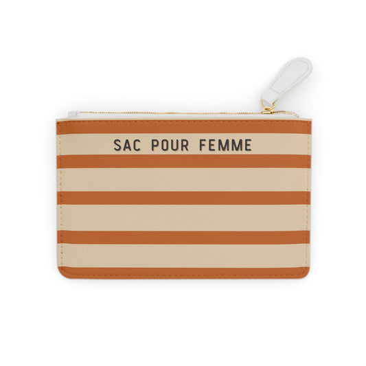 Striped pouch with 'SAC POUR FEMME' text on a white background