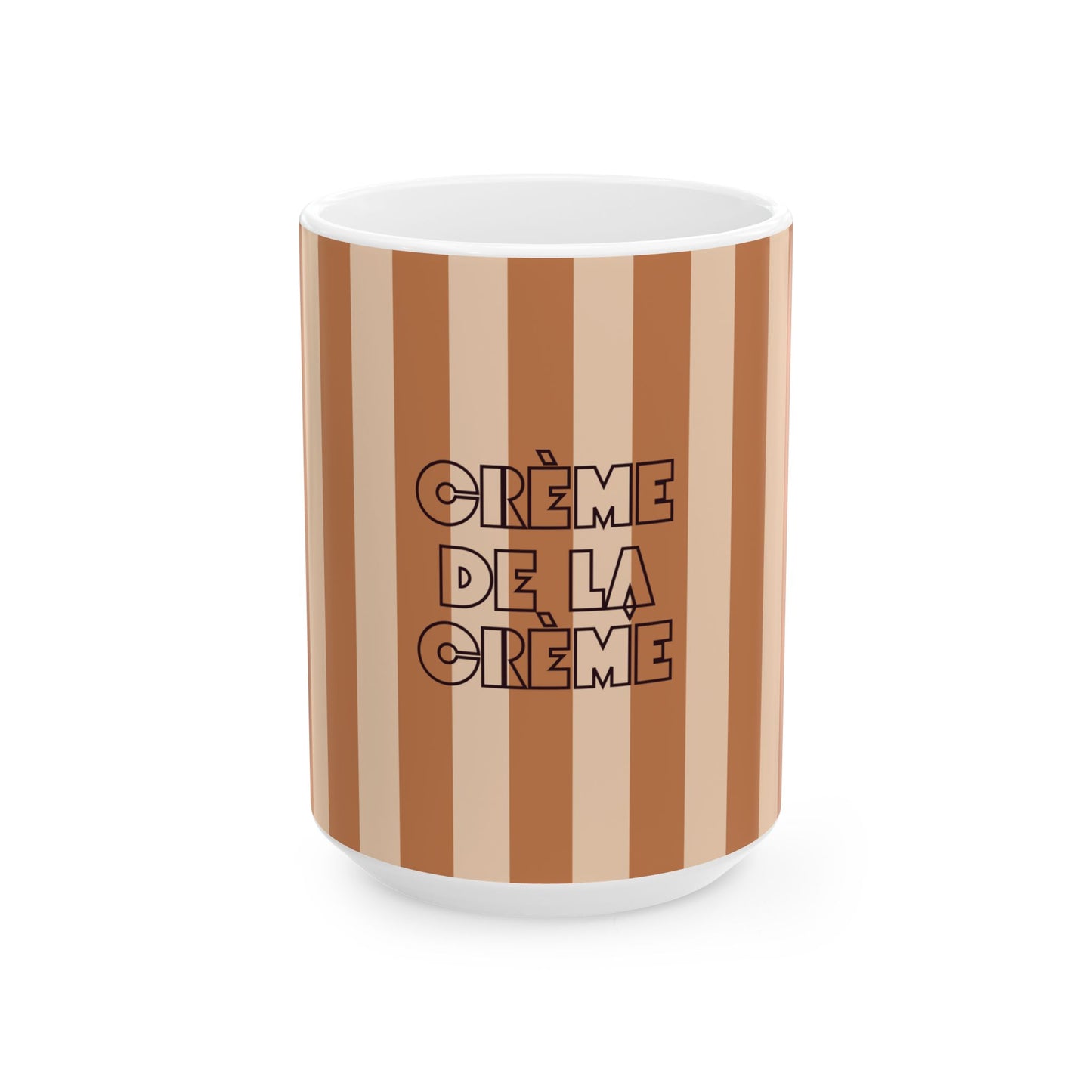 A white ceramic mug with a brown and beige vertical striped design, featuring the text 'CRÈME DE LA CRÈME' in black outline lettering on the front.