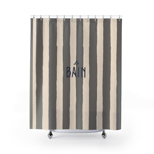 Striped shower curtain with 'Le Bain' text on a white background