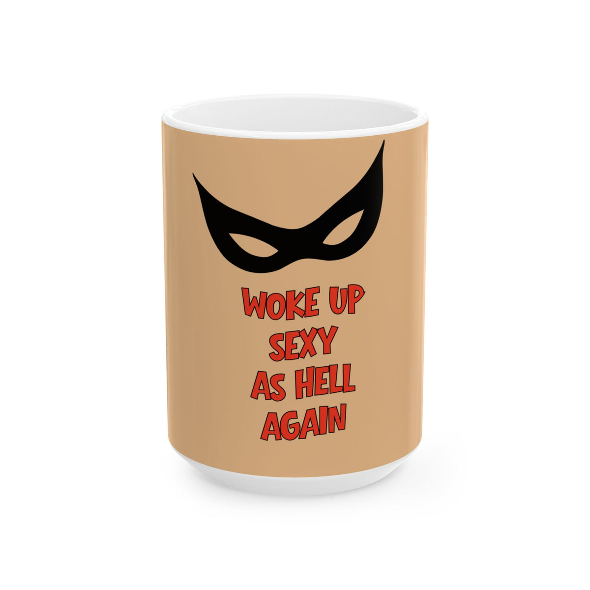 A white ceramic mug with a tan printed wrap design featuring a black mask graphic and the red text 'WOKE UP SEXY AS HELL AGAIN'.