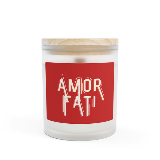 Candle with a red label displaying 'AMOR FATI' on a white background
