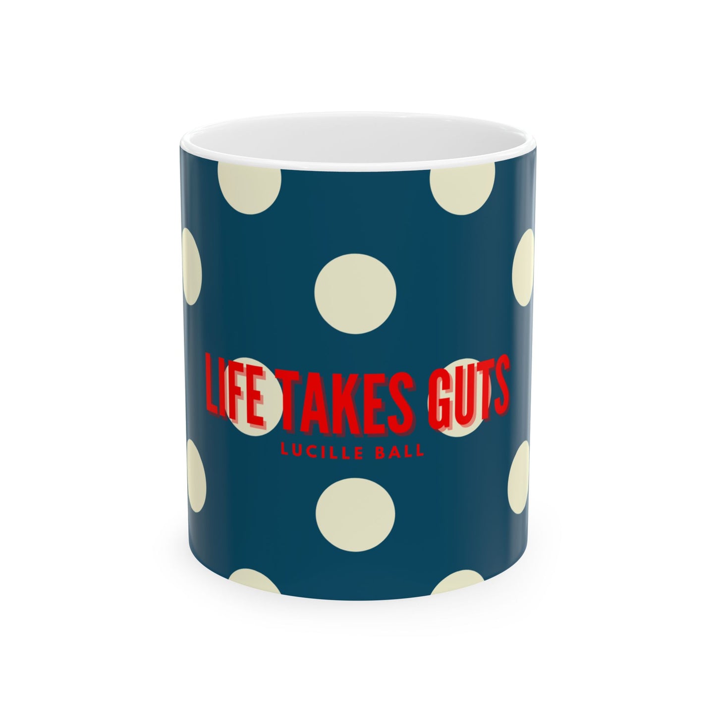 Mug with blue polka dot pattern and red text 'Life Takes Guts' on a white background