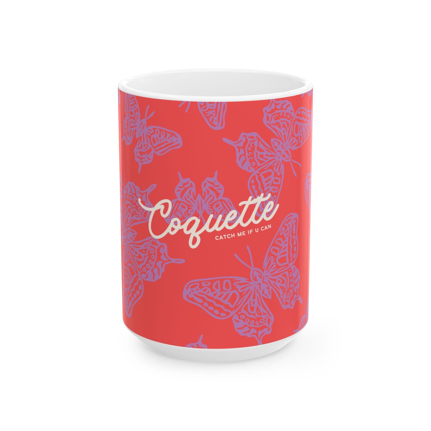Mug with butterfly design and 'Coquette' branding on a red background