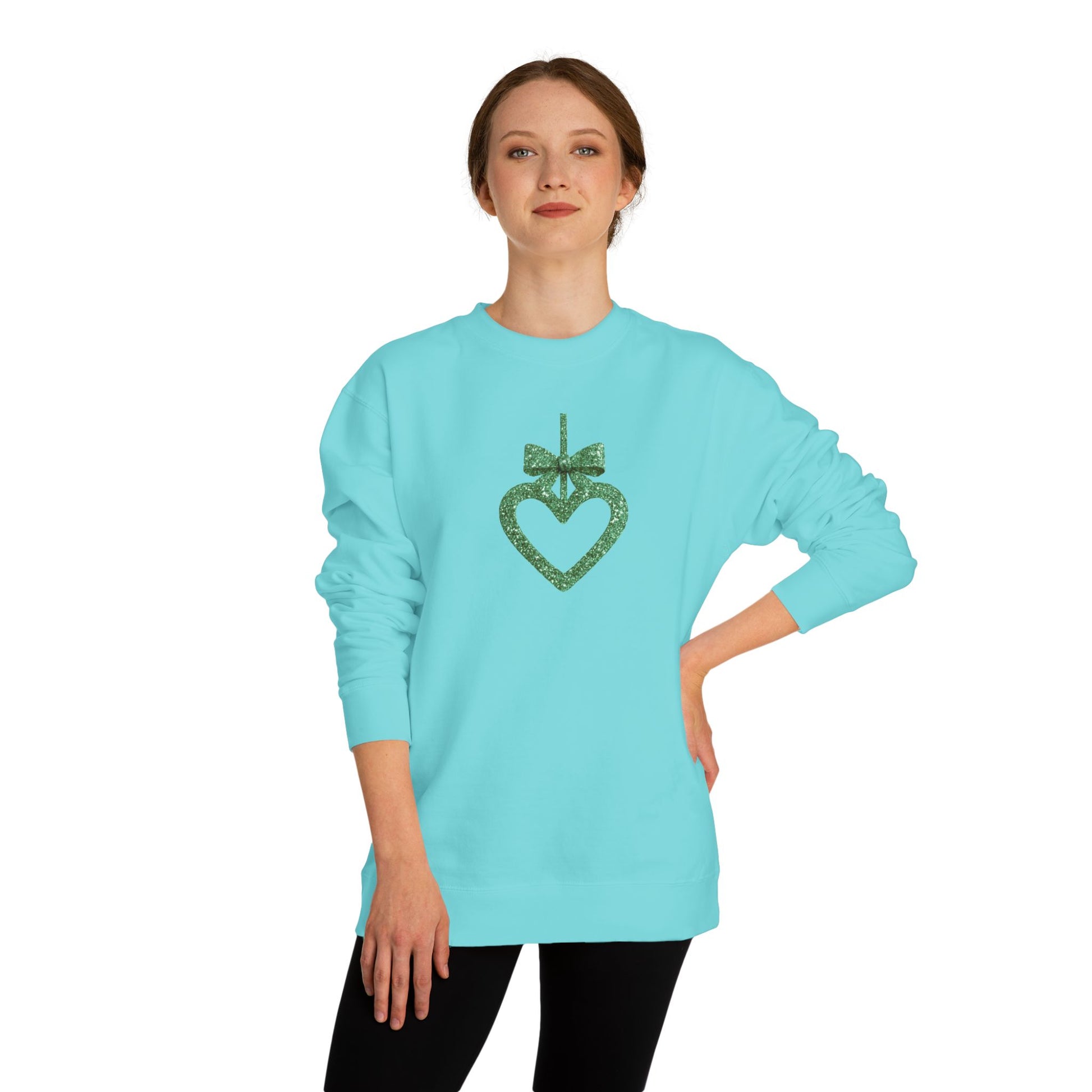 Light blue sweatshirt with a decorative heart design worn by a model on a white background