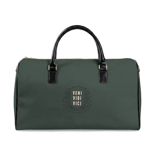 Green duffel bag with black handle and 'YENI VIDI VICI' logo on a white background