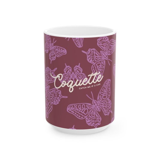 Mug with butterfly design and 'Coquette' branding on a white background
