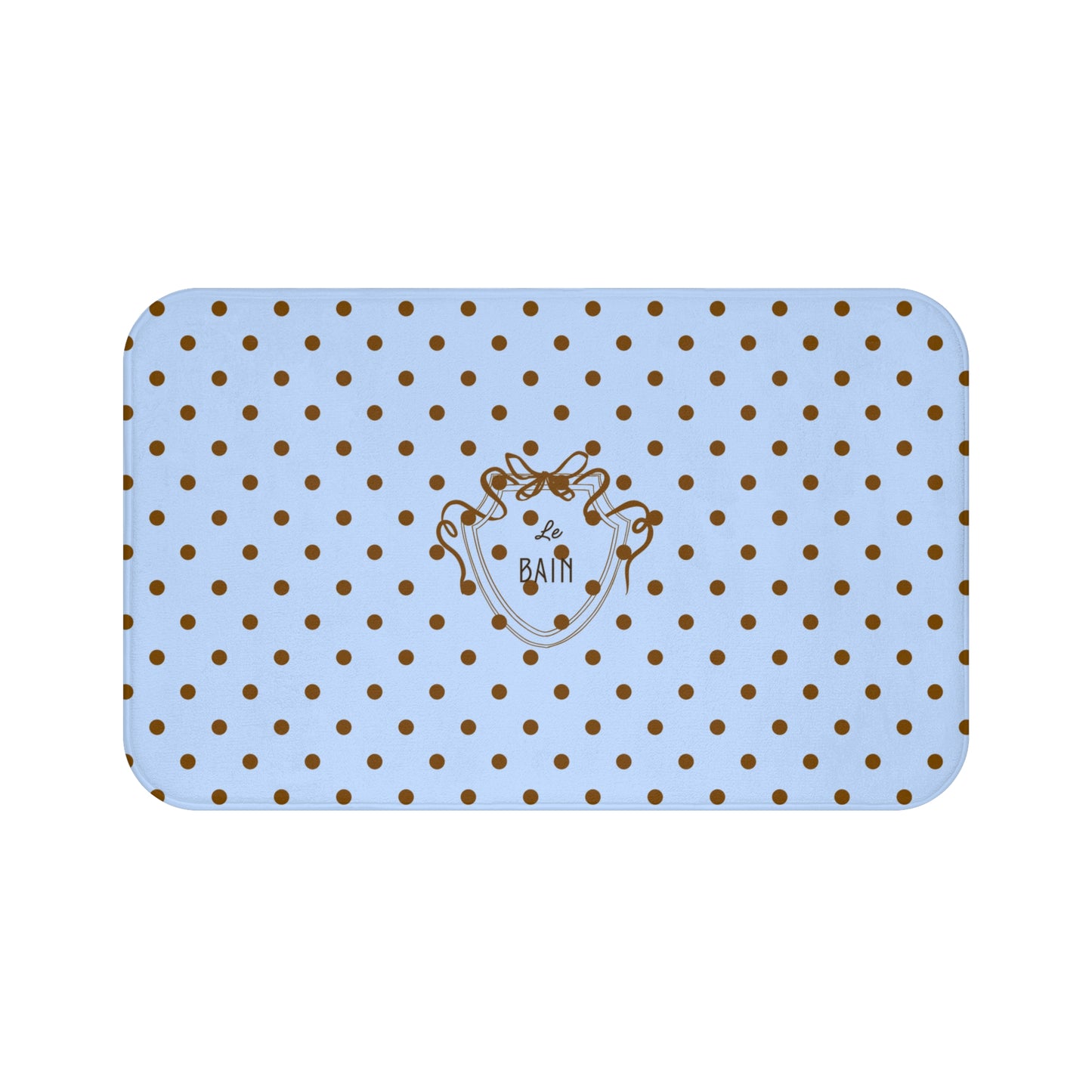 Rectangular blue bath mat with gold polka dots and a logo on a white background