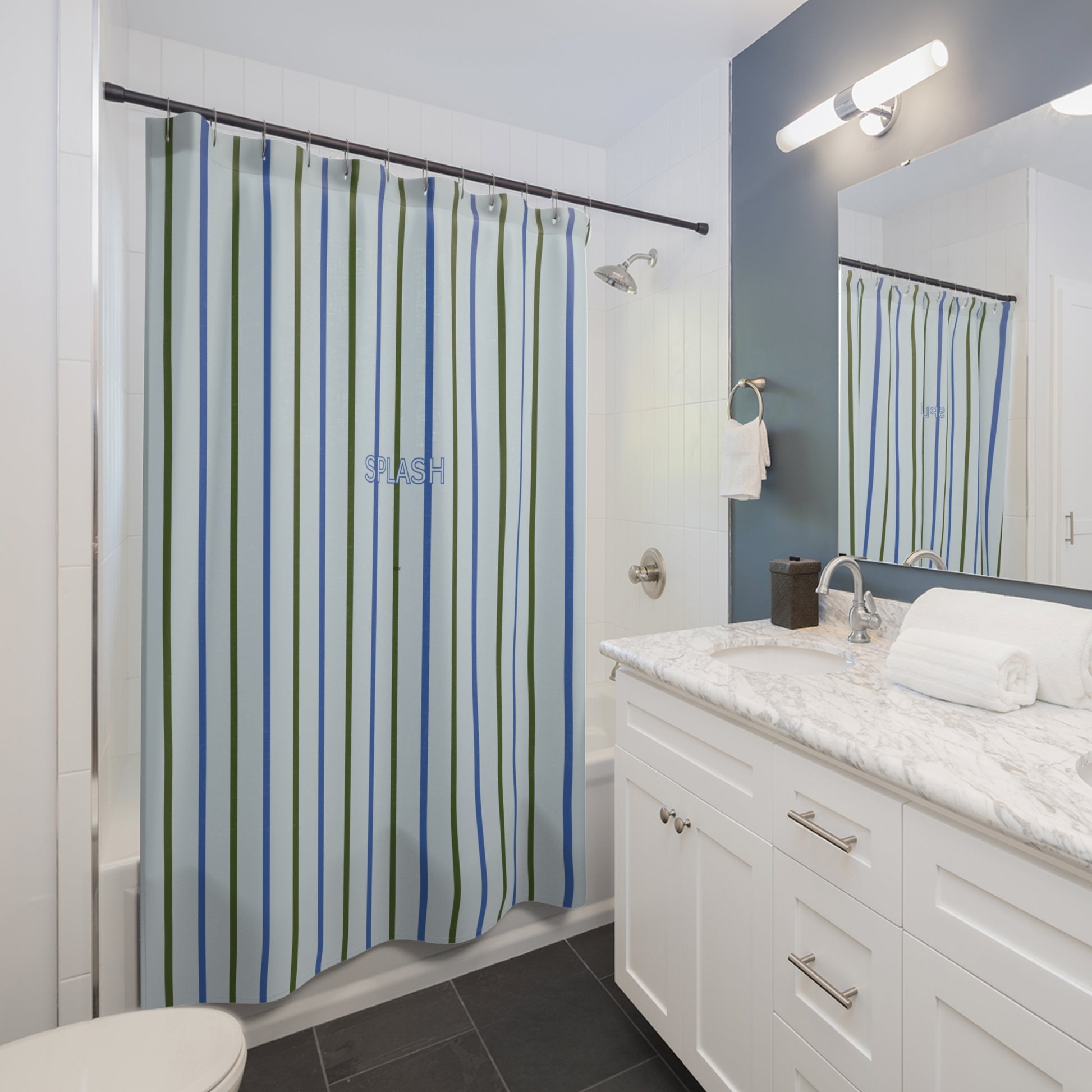 Bathroom with striped shower curtain, sink, and mirror.