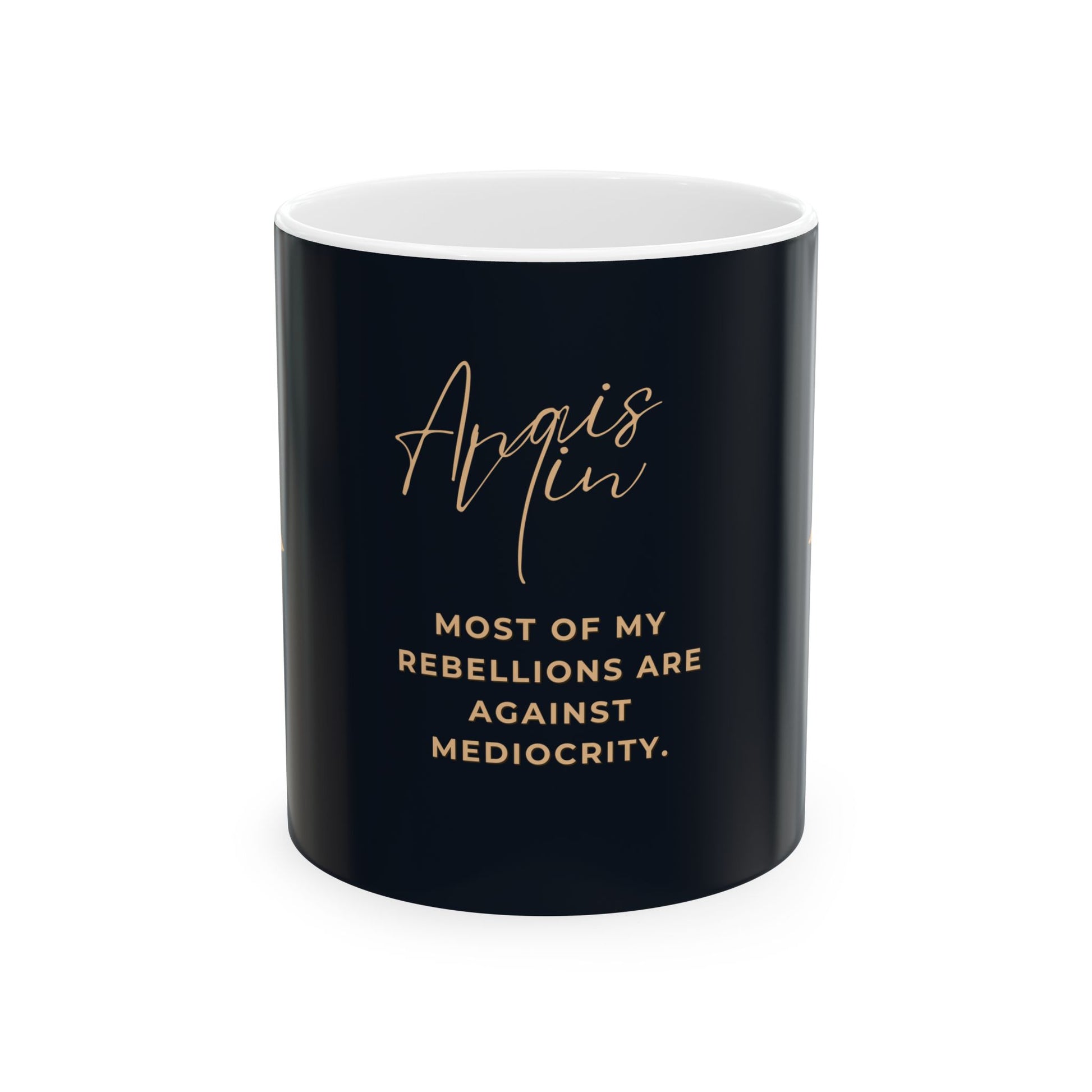 Black mug with white interior, gold text 'Angis Min' and 'Most of my rebellions are against mediocrity.' on a white background.