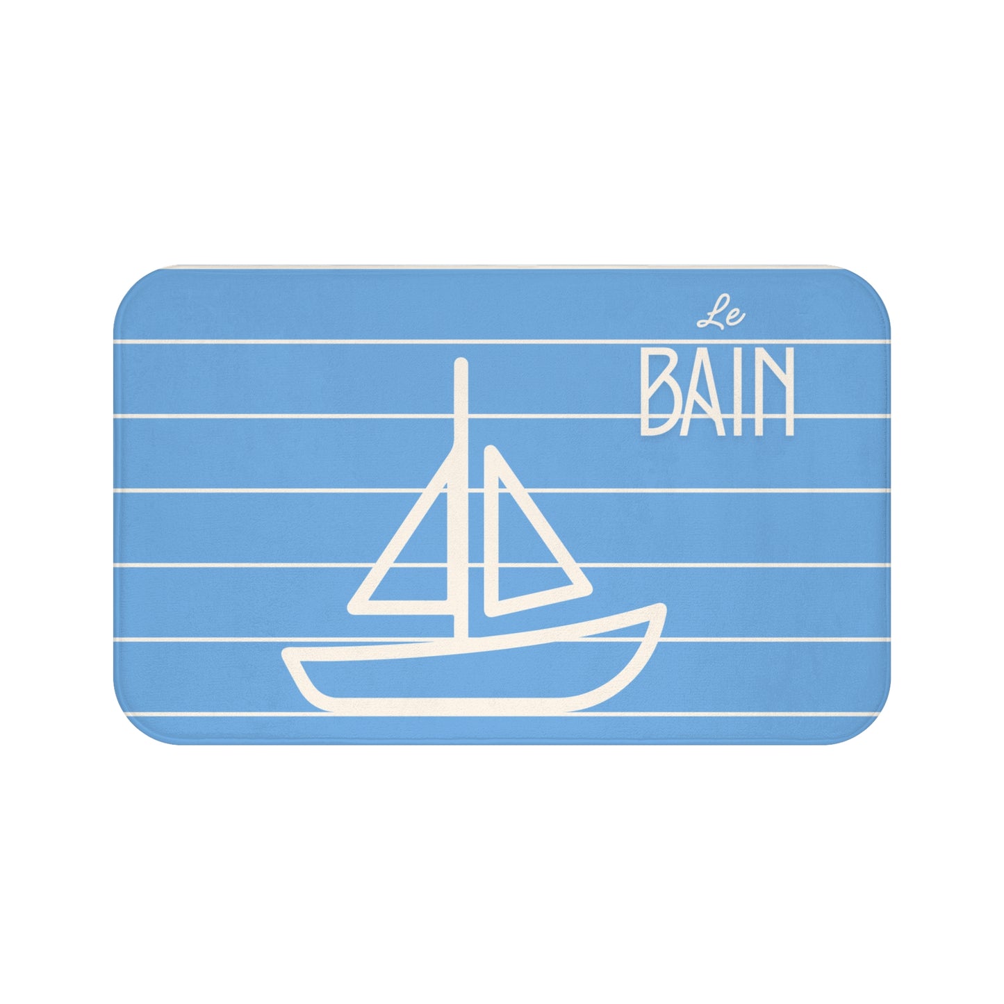 Blue mat with white sailboat design and 'Le Bain' text on a white background