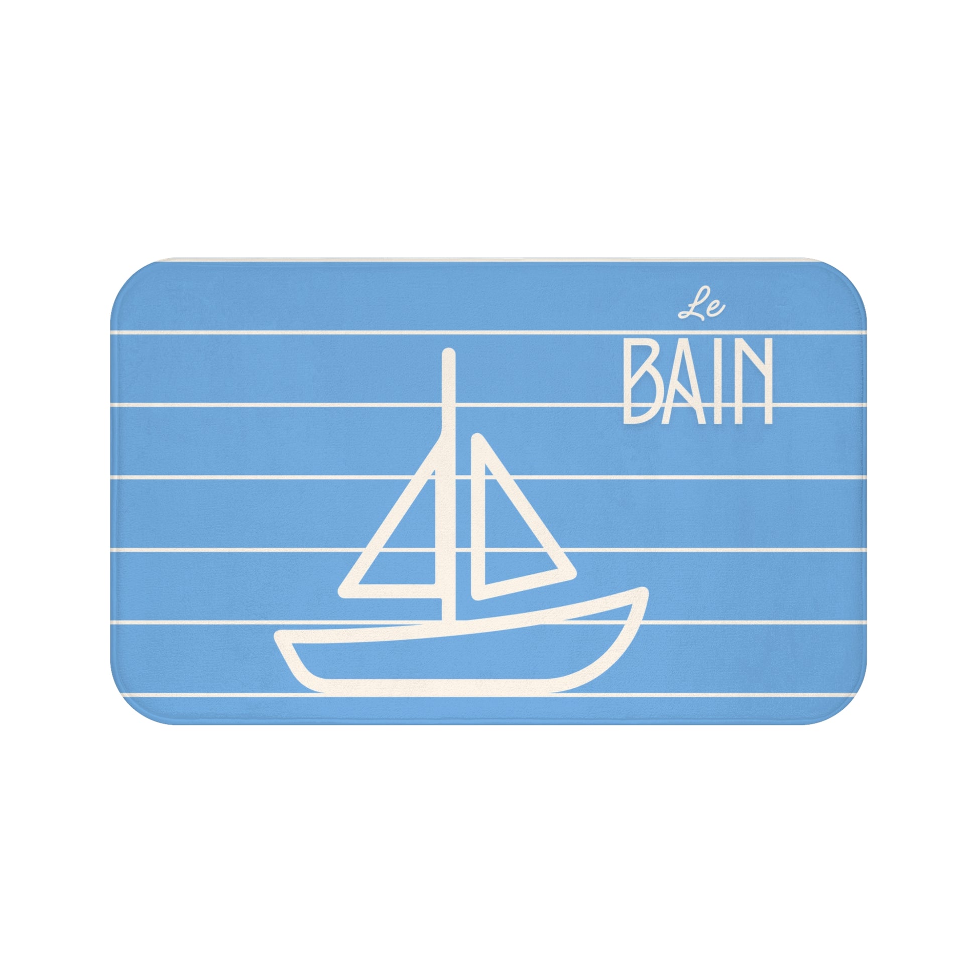 Blue mat with white sailboat design and 'Le Bain' text on a white background