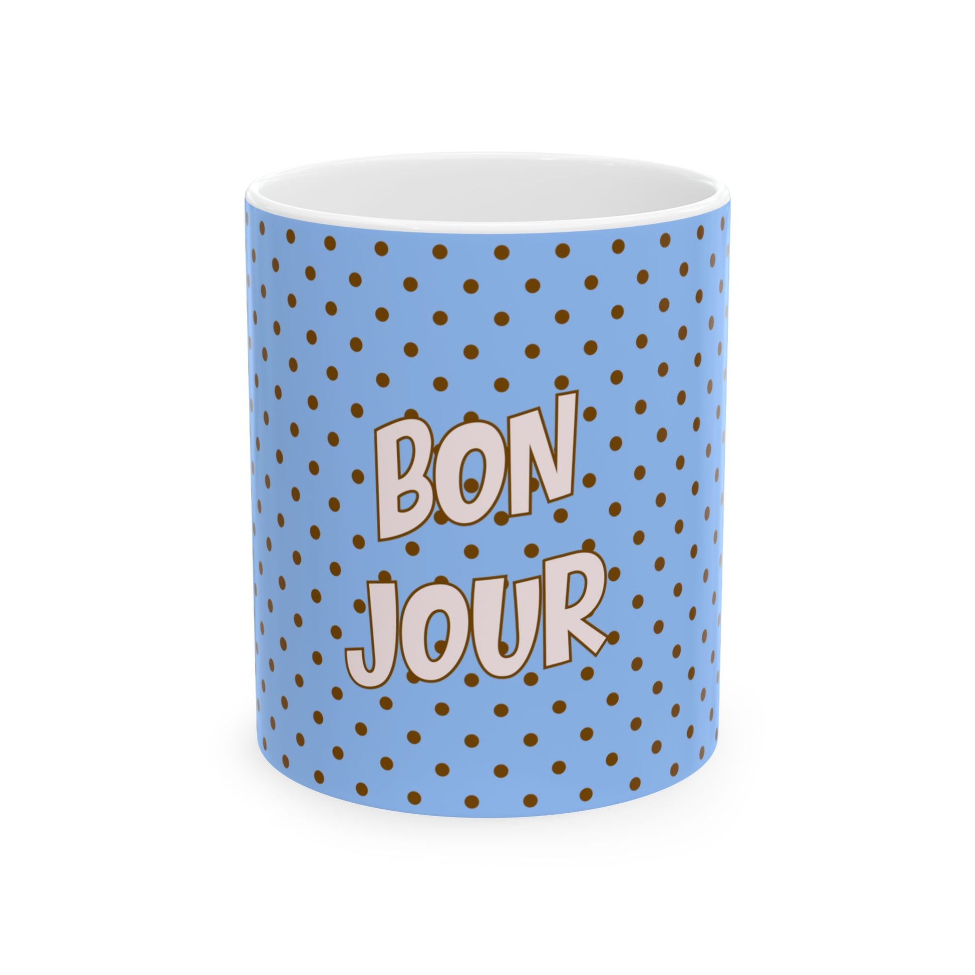 Mug with 'Bonjour' text on a blue polka dot background