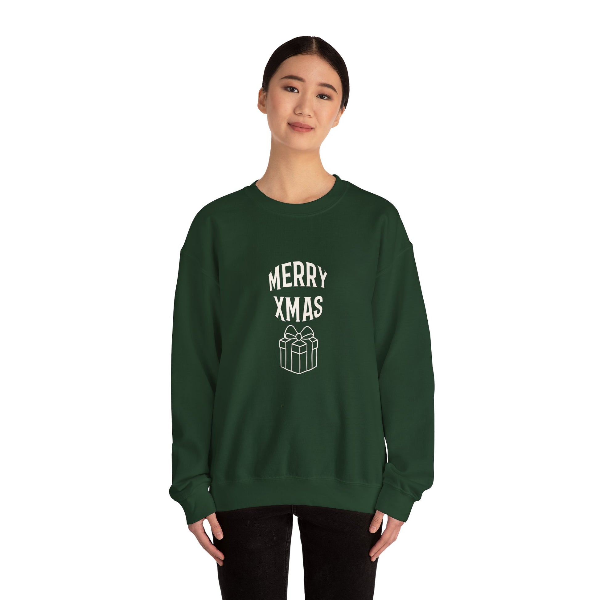 Person wearing a green sweatshirt with 'Merry XMAS' text and gift graphic on a white background